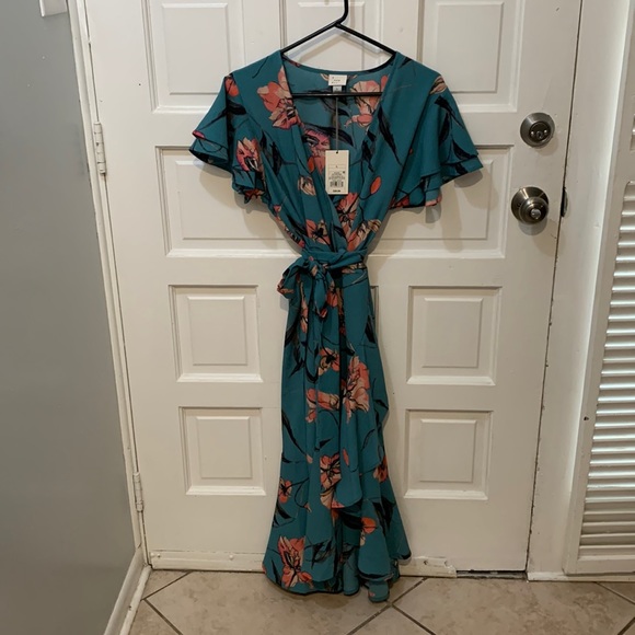 a new day Dresses & Skirts - Beautiful floral print hi lo, faux wrap dress with ruffle sleeves